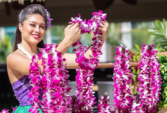 woman holding leis